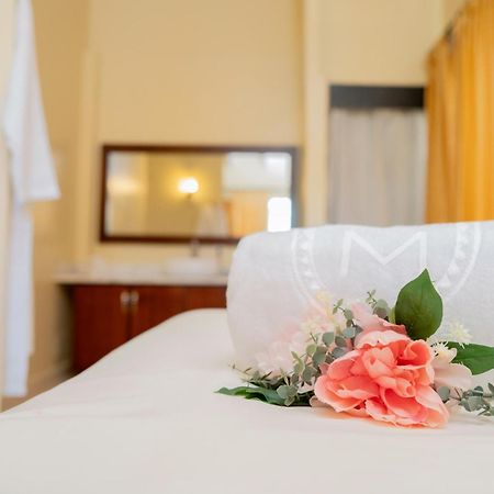 Majestic Colonial Punta Cana (Adults Only) Exterior photo A bed with a flower